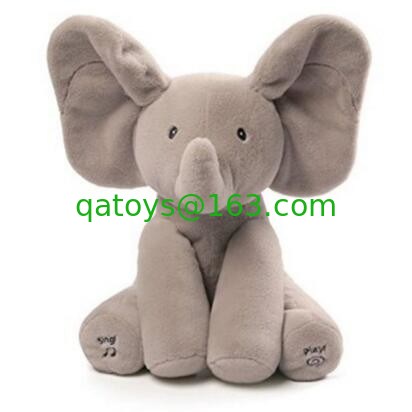 Ojeada gris juguetes del abucheo de una felpa de la música, juguete relleno electrónico del elefante
